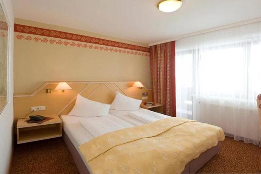 Dvoulůžkov&yacute; pokoj, sprcha/WC (cca 30 m&sup2;, TuiBE), AI